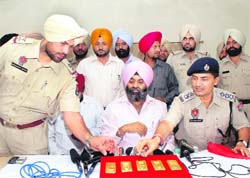 The gold that was seized from two persons as they tried to ferry it without paying tax at Rajpura on Tuesday. 