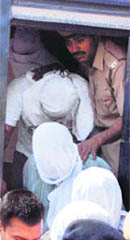 Members of the Special Task Force being produced in a Panipat court on Tuesday.