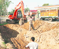 Construction work on for the four-laning of the Kunjwani-Satwari road in Jammu.