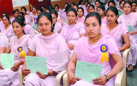 Students of the MGN College of Education wait for their turn to donate blood in Jalandhar.