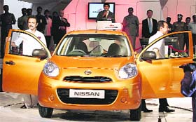 Tamil Nadu Deputy Chief Minister MK Stalin and Renault Nissan CEO Carlos Ghosn come out of Micra car during the inauguration of Renault Nissan Alliance Plant at Oragadam in Kanchipuram district