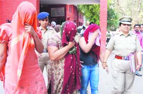 The girls arrested on the charge of immoral trafficking at the Sector 34 police station in Chandigarh