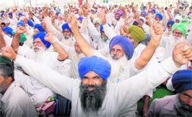 Members of the BKU-Ikta (Sidhupur) protest in support of their demands at the rally ground in Sector 25, Chandigarh