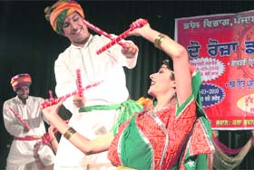 Students perform a Rajasthani dance at the Kala Bhawan in Patiala