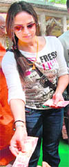 Actress Esha Deol gives dakshina at an ashram in Haridwar 