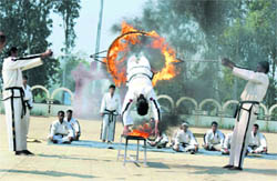 Daredevils of the ITBP Academy, Mussoorie, show their skills at the Madhuban Police Academy in Karnal