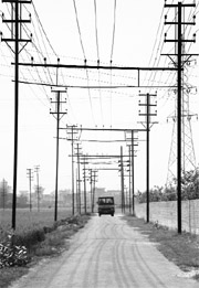 Overhead electricity cables pose a threat to the lives of motorists passing this stretch at Madinpur, Fatehgarh Sahib.