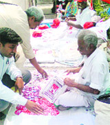 A Basha from Madurai, Tamil Nadu, sells accessories during the 13th All-India CITU Conference at Zirakpur on Thursday.