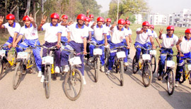 Army men flash victory sign during the start of a cycle-cum-trekking expedition in Ambala Cantonment.