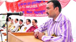 A speaker addresses a gathering at a convention of the BSNL Employees Union in Dehradun on Thursday.