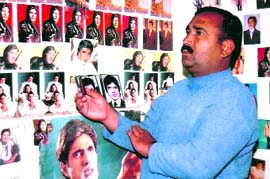 Mohinder worships his god, Amitabh Bachchan, at his house in Pundri, near Kaithal.