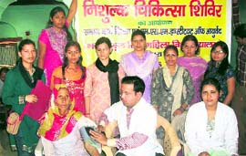 An aged woman is examined during a free medical camp at Khanpur Kalan village.