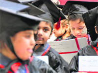 Tiny tots during a graduation ceremony at BCM Arya Senior Secondary School in Ludhiana on Thursday. 