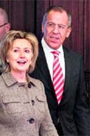 US Secretary of State Hillary Clinton and Russia's Foreign Minister Sergei Lavrov enter a hall as they meet in Moscow on Tuesday. Clinton visited Russia on Thursday to clear obstacles to a new treaty cutting arsenals of nuclear weapons and to seek Moscow's backing for tougher sanctions against Iran.