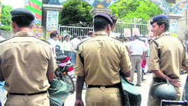 Policemen deployed at the DAV PG College for the annual examinations in Dehradun on Friday.