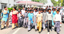 Government school students from the Dewal area of Chamoli district visit the state Assembly in Dehradun on Friday.