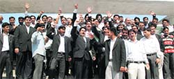 Advocates protest against the alleged manhandling of a colleague by policemen in Jammu on Friday.
