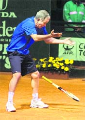 John McEnroe reacts during his match against Thomas Enqvist at the ATP Champions Tour tournament in Bogota on Thursday