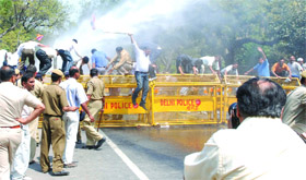 Bharatiya Janata Party activists protest against the milk price rise at Jantar Mantar in New Delhi on Saturday. 