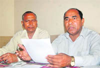 Kunwar Singh, a social worker, addresses mediapersons in Dehradun