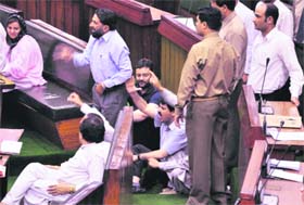 Members of the NC and the PDP stage a dharna in the Assembly demanding the tabling of the Bill that bans inter-district recruitments, in Jammu