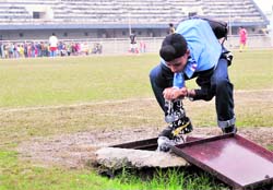A sportsman drinks water from a faulty water tap at Guru Nanak Stadium in Ludhiana. A Tribune photograph