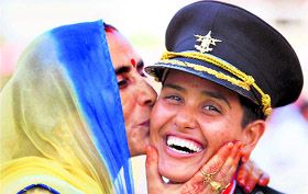 A woman cadet along with her grandmother during the passing-out parade at Officers Training Academy in Chennai on Saturday.
