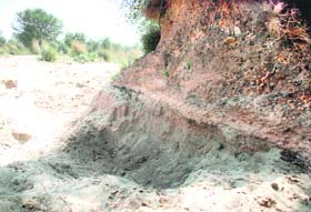 The path of a seasonal rivulet in Parol village is bound to change with deep craters being dug up by illegal land mafia near Chandigarh