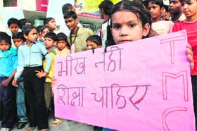 Children from economically weaker sections take out a rally, demanding 15 per cent quota in private schools, at the Sector 17 Plaza in Chandigarh