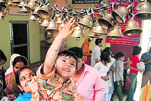 Devotees offer prayers during the navratri festival at Shri Devikup Bhadrakali Temple in Kurukshetra on Sunday.