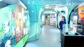 A science communicator waits for students in the Science Express at Jammu Tawi Railway Station on Sunday.