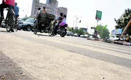 The recently painted zebra lines on a city road which have vanished. Tribune photo: Himanshu Mahajan