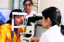 An opthalmologist examines a patient at a medical camp in Ludhiana on Sunday. A Tribune photograph