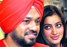Gurpreet Ghuggi and Navneet Kaur at a press conference in Ludhiana on Sunday. A Tribune photograph