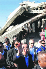 UN Secretary-General Ban Ki-moon (centre) at a destroyed house in Jebaliya, northern Gaza Strip, on Sunday. The UN chief entered the blockaded Gaza Strip, where 15 lakh people have been under lockdown by Israel and Egypt for nearly three years.