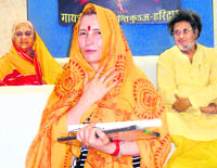 Shaji Umalatova takes diksha at Shantikunj in Haridwar on Monday.
