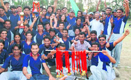 Winners of the FRI Annual Sports Meet with their medals and trophies at the concluding function in Dehradun on Monday.