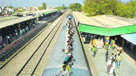 Not caring two hoots for personal safety, these passengers were found travelling on the roof of a train at Gurgaon railway station