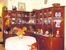 Crockery cabinet with antique silver ware