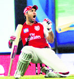 Yuvraj SIngh celebrates hitting the winning runs on Sunday. 