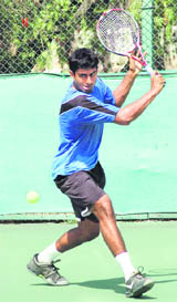 A player in action during the ITF Mens Circuit at CLTA in Chandigarh on Tuesday.