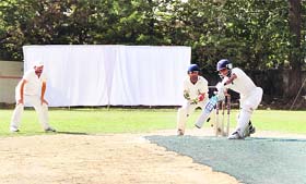A batsman tries a cover drive during a match at the 3rd All-India Uttarakhand Cup Cricket Tournament in Dehradun