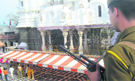 Even as an armed guard keeps a vigil at Bajjreshwari temple, Kangra, in view of the KCF threat during Navratra, it wears a deserted look.