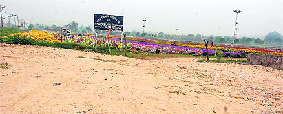 In the absence of proper roads, flower garden in the Bhour Camp fails to attract visitors. 