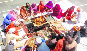 Devotees perform rituals on the occasion of Ram Navami at Ganj Mandir in Shimla on Wednesday. 