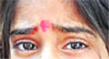 Grief and terror in the eyes of the victims sister