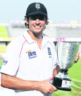 Englands cricket captain Alastair Cook with the trophy after winning the second Test and the series against Bangladesh in Dhaka on Wednesday.