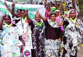 Rag-pickers demand photo-identity cards during a demonstration at Jantar Mantar in New Delhi on Thursday.