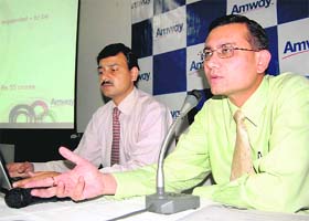 Bhuvan Kapur, vice-president (north) of Amway, addresses mediapersons in Dehradun