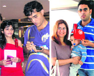 Left Saurav Ganguly with Sakshi;Right Yuvraj Singh with a fan